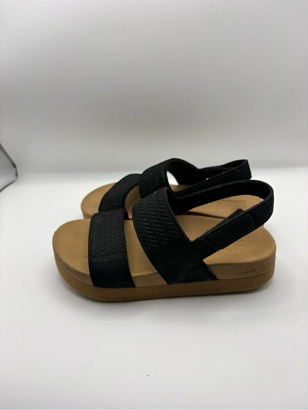 Reef Women’s Black and Tan Double-Strap Sandal
